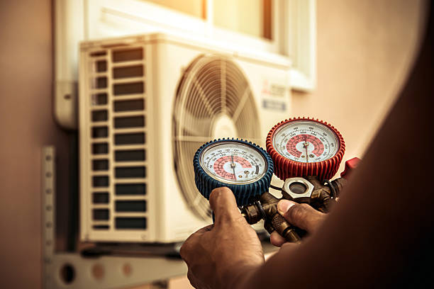 Professional Hvac technician working in Rushsylvania, OH